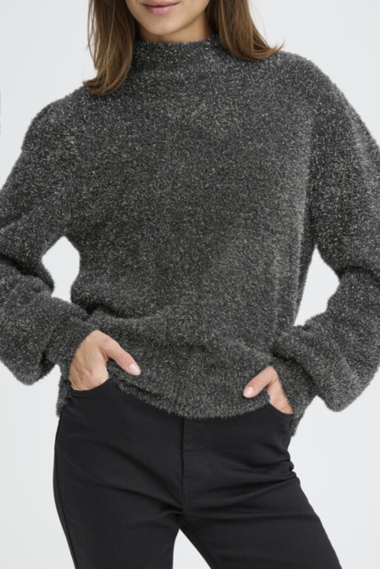 Bluse med sølvfarvede nister