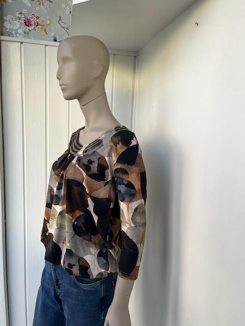 Bluse med elastisk kant i gyldne farver