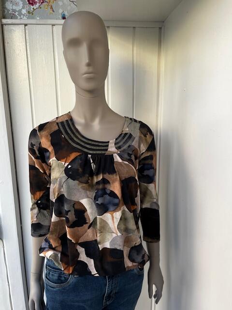 Bluse med elastisk kant i gyldne farver