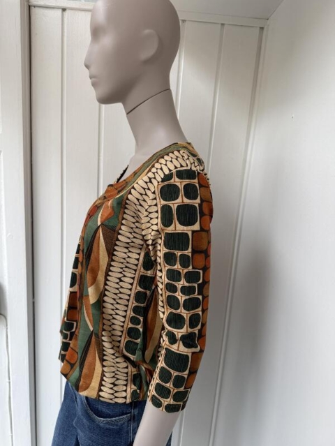 Bluse med elastisk kant i gyldne farver